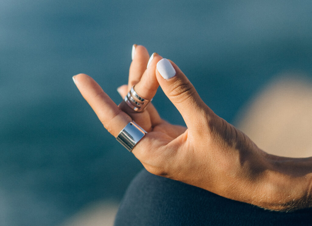 Meditating hands symbolize the mental clarity meditation can bring and help you take control of your life