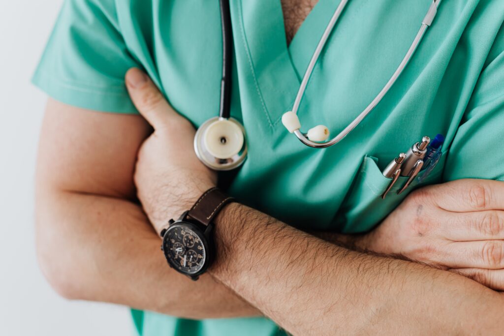 A Health care worker in scrubs